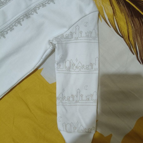 Juniors white cotton romper with designs, 6-9 months