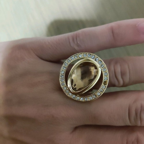 Ring like new with small missing stone, not real