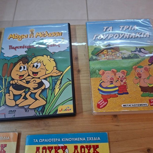 Collection of 10 children's animated DVDs with cases, dubbed