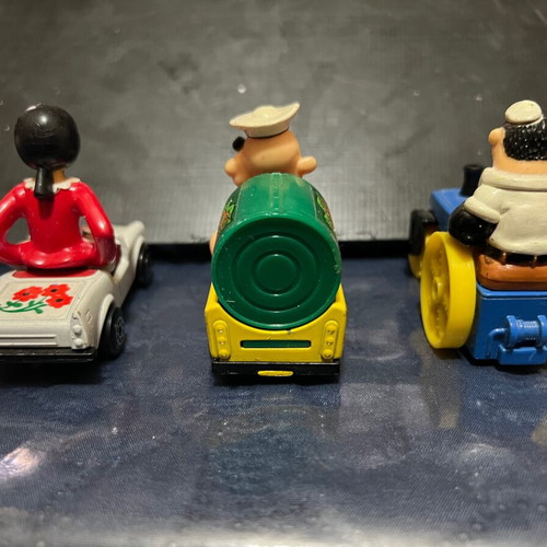 Comic figures in Matchbox Gorgi cars used, pack of 7
