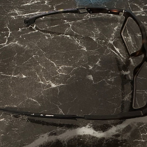 Carrera eyeglass frame used, black with light brown