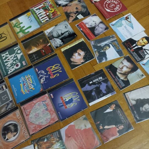 43 assorted DVDs with songs and movies