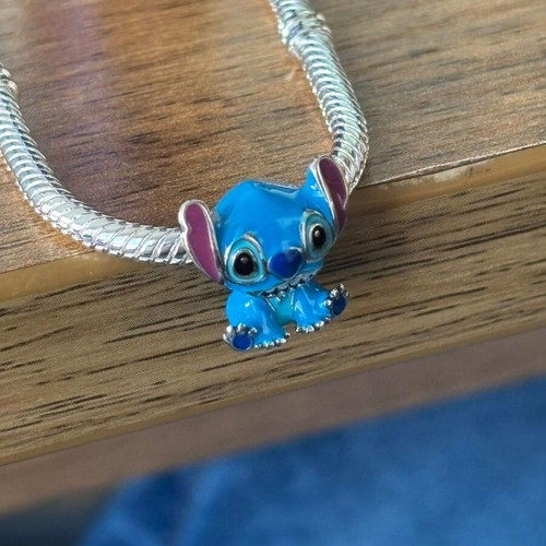 Pandora Stitch Charm like new, blue