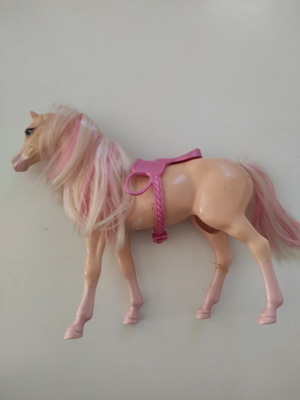 Toy horse for girl used, height 25 cm length 27 cm