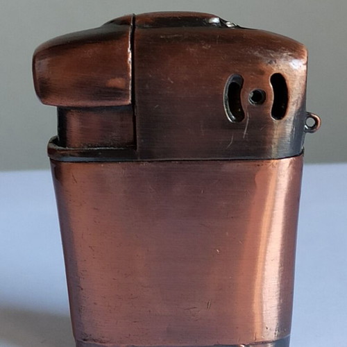 Vintage metal windproof lighter with shirt design, like new