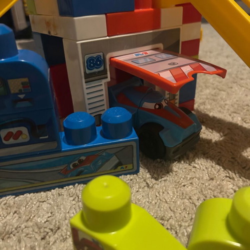 Mega Blocks First Builders Race Car Garage set like new with 60 pieces