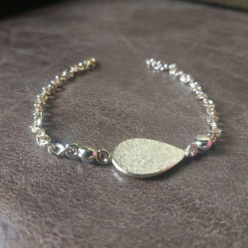 Gold bracelet new with eye and blue, turquoise, white stones