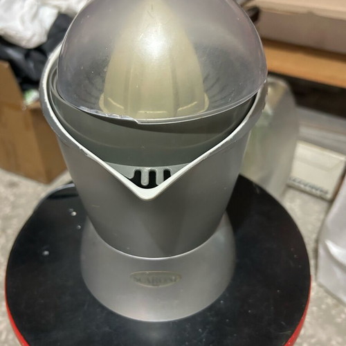 Scaroni electric juicer used with normal wear on metal edge