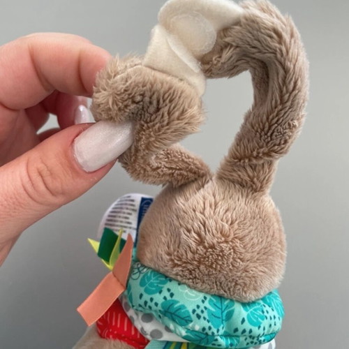Musical hanging teddy bear like new with teether and lullaby