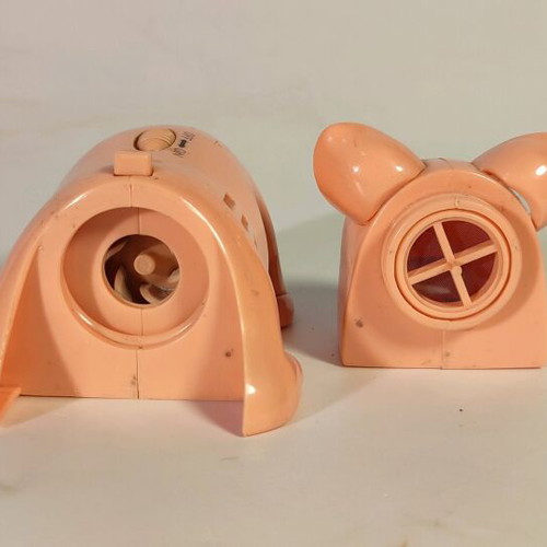 Pig-shaped handheld vacuum cleaner used, functional