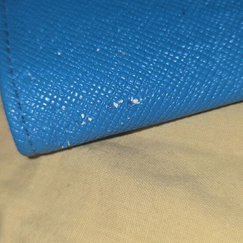 Wallet used, blue with orange details