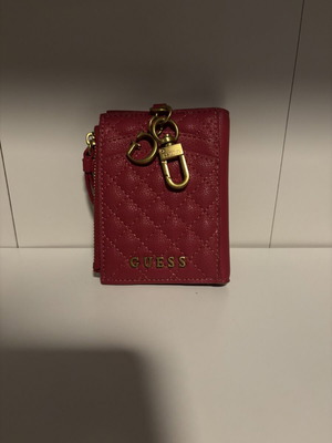 Guess women's wallet with keychain, burgundy quilted design