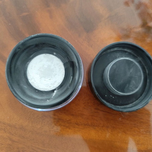 Makeup Forever HD powder used, loose powder
