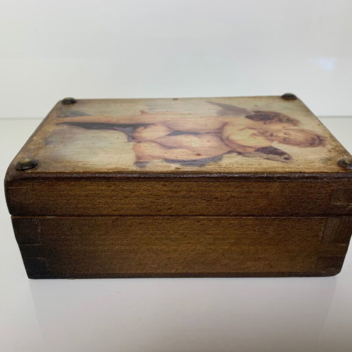 Wooden storage box used with angels