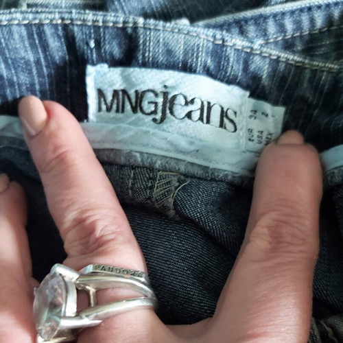 Φούστα denim Mango XS/S σαν καινούργια, ασύμμετρο σχέδιο με τσέπες