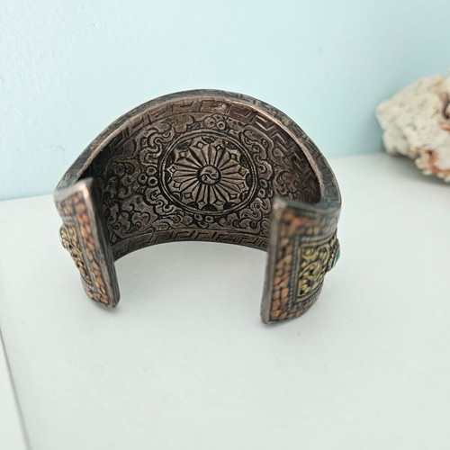 Handmade carved bracelet used with turquoise and silver