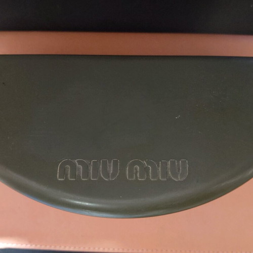 Miu Miu sunglasses used with case and cloth, black and gold
