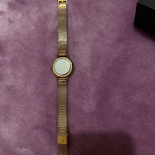 Daniel Wellington women's watch used with gold bracelet