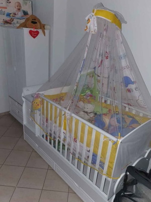 Baby Cot convertible to bed with nightstand, drawer, and wardrobe like new