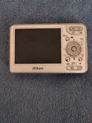Nikon camera used, battery missing, works normally