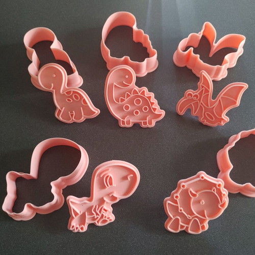 Set of 5 cookie cutters with stamps, dinosaur designs like new