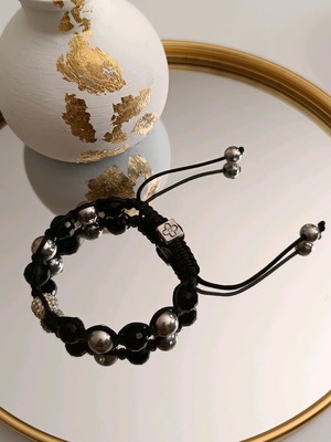 Macramé bracelet with crystals and metal beads