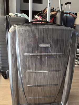 Samsonite hard suitcase used with TSA lock and 4 wheels