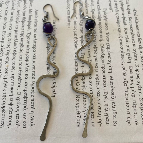 Handmade hanging earrings used, hammered design
