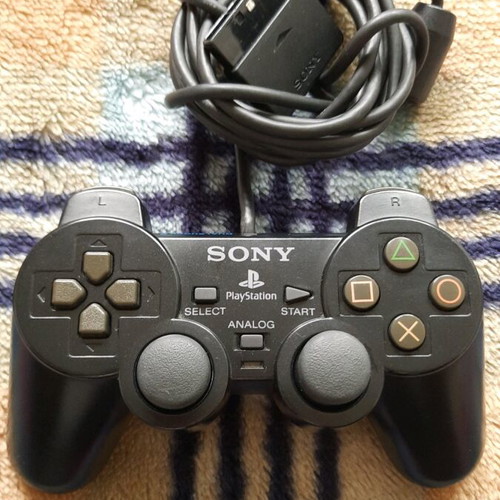 PlayStation 2 original controller used with good analog sticks