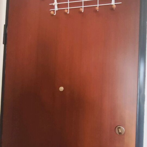Metal coat rack used white with wooden ends and 10 hooks
