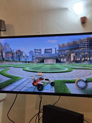PS4 Pro 1TB console used with two controllers