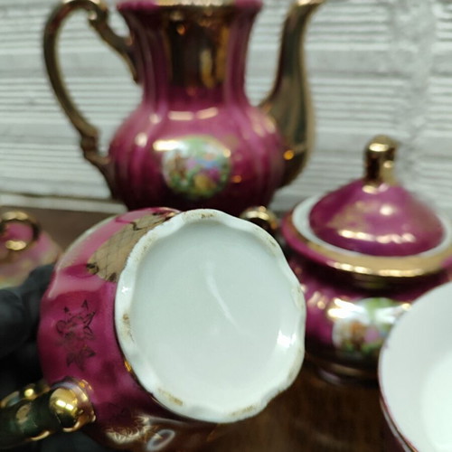 Porcelain coffee set used, 15 pieces, burgundy-fuchsia with gold details