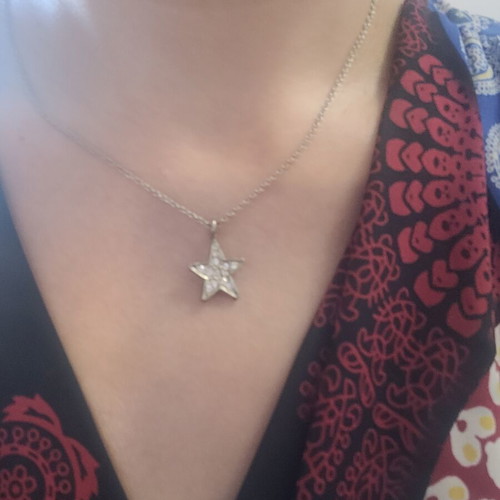 Star design necklace with rhinestones