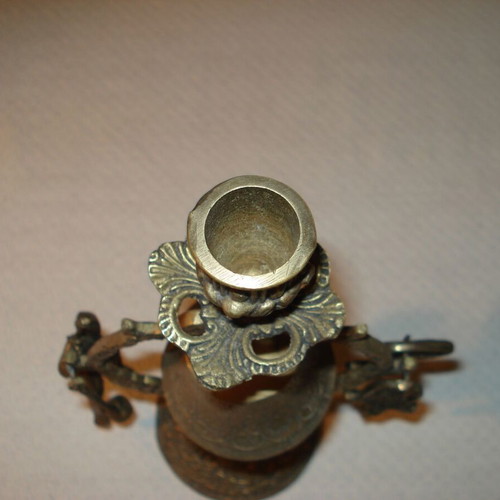 Brass candlestick with bell used