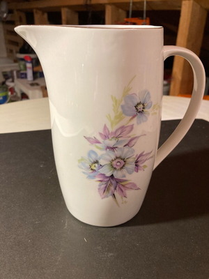 Porcelain jug like new with floral design
