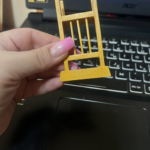 Miniature yellow chair used