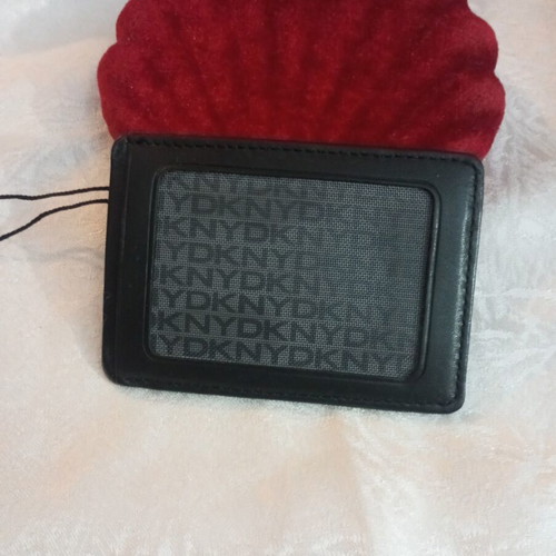 DKNY pin with metal clip like new