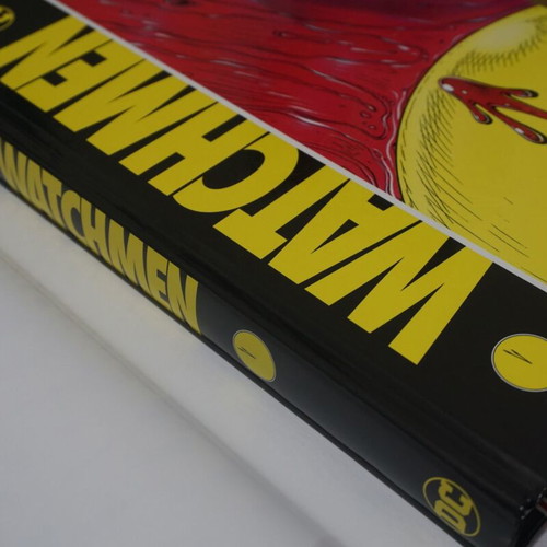 Watchmen Deluxe edition hardcover new, signed by John Higgins