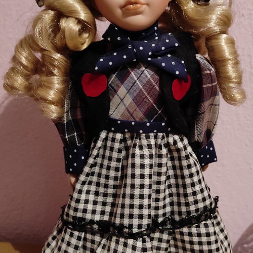 Porcelain doll used, 30 centimeters tall