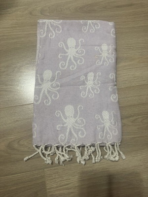 Pestemal beach towel used with octopus pattern and fringes