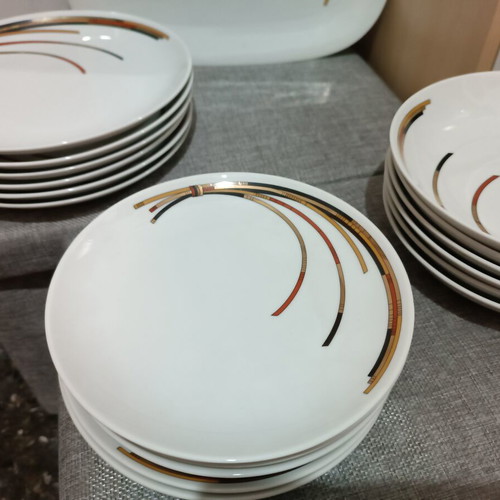 Porcelain dinnerware set with 6 dinner, 6 soup, 6 fruit plates and large serving platter
