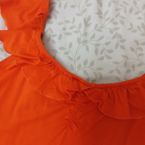 Beige shorts and orange top set