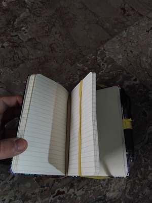 Notebook with hard cover and colorful floral design, like new
