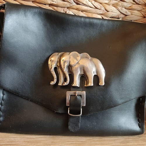Leather crossbody bag used black with silver elephant buckle