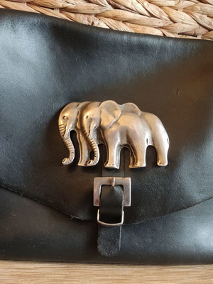 Leather crossbody bag used black with silver elephant buckle