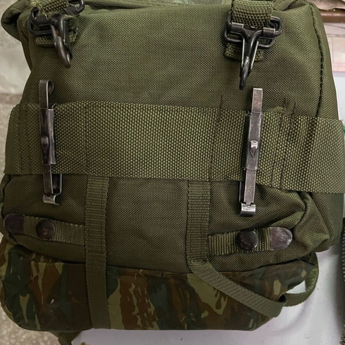 Military backpack M71 used with waterproof cover and ES canteen