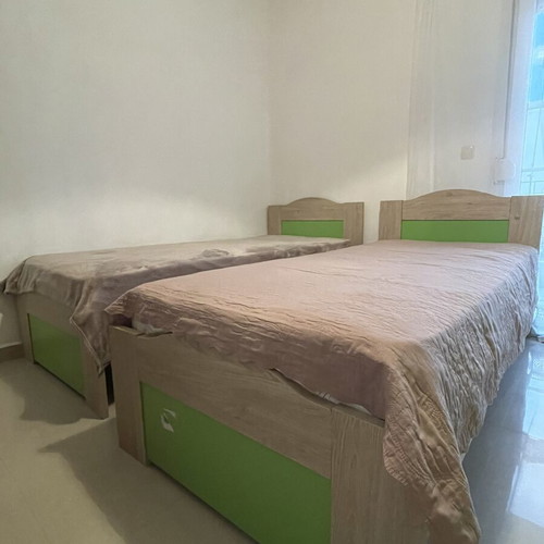 Wooden single beds with mattresses like new, set of 2