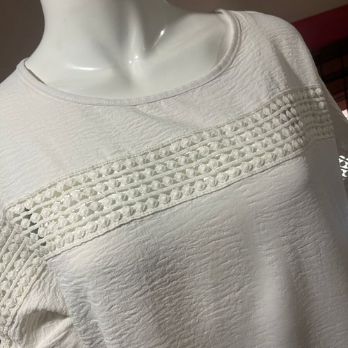 Blouse XL used, light beige with embossed chest design and cuff revers