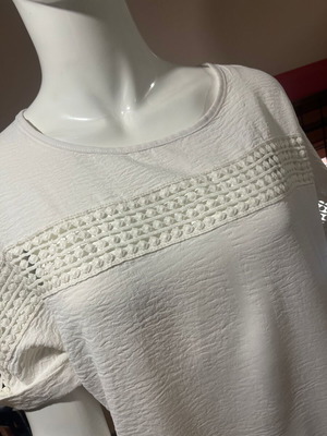Blouse XL used, light beige with embossed chest design and cuff revers