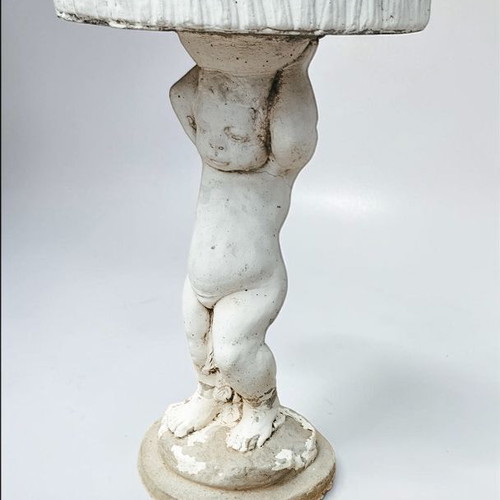 Vintage cement garden decoration with cherub angel used
